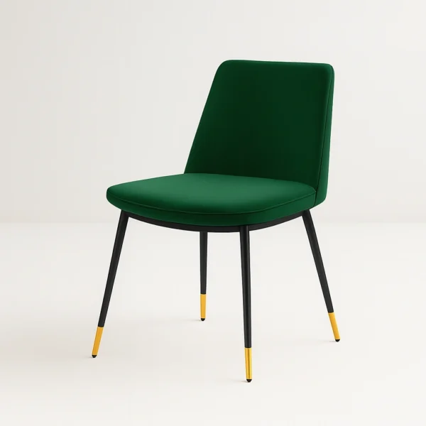 Aurora dining chair upholstered in rich green velvet fabric showcasing a luxury minimalist frame.