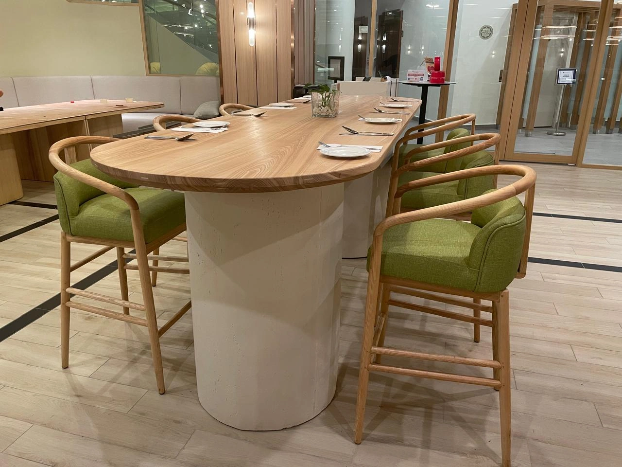 Essex Bar Chairs lined up at a modern kitchen island counter