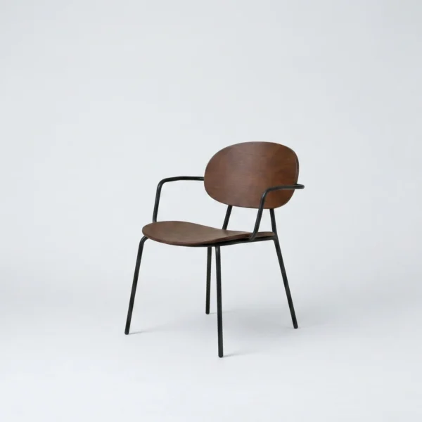 Mario dining chair featuring an industrial modern bentwood armchair silhouette.