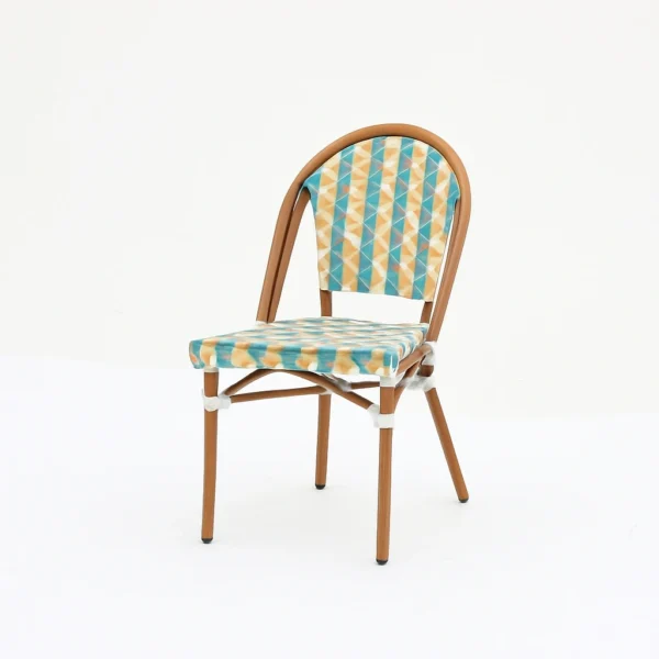 Alya side dining chair featuring a sleek armless silhouette and textured weave finish.